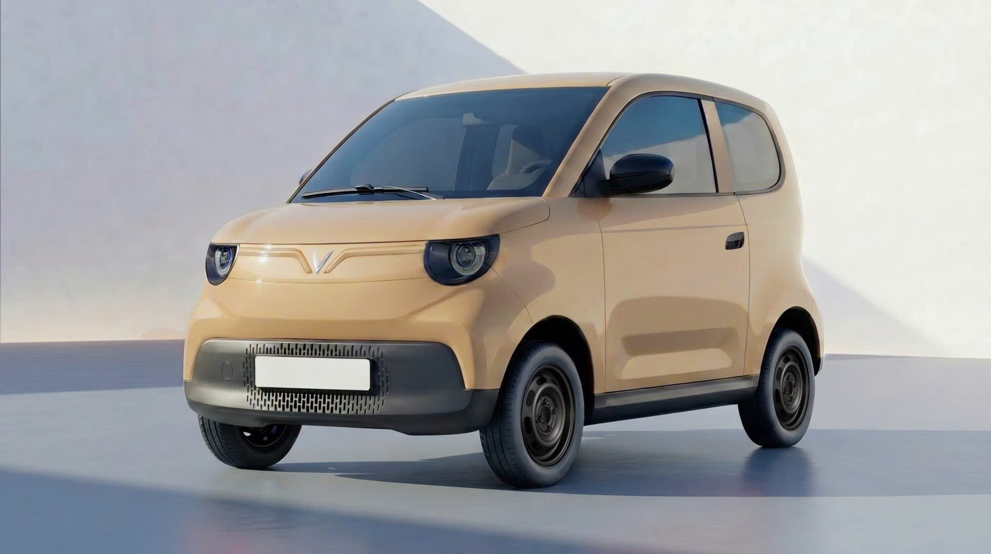 VinFast VF2 góc chéo trước bên phải màu vàng cát — đèn tròn, cản nhựa đen, SUV điện hạng A Em Út